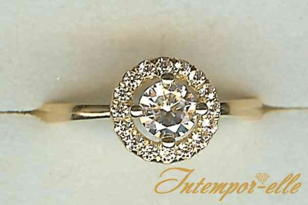 # Bague entourage ( Halo ) or jaune 18k avec zircon