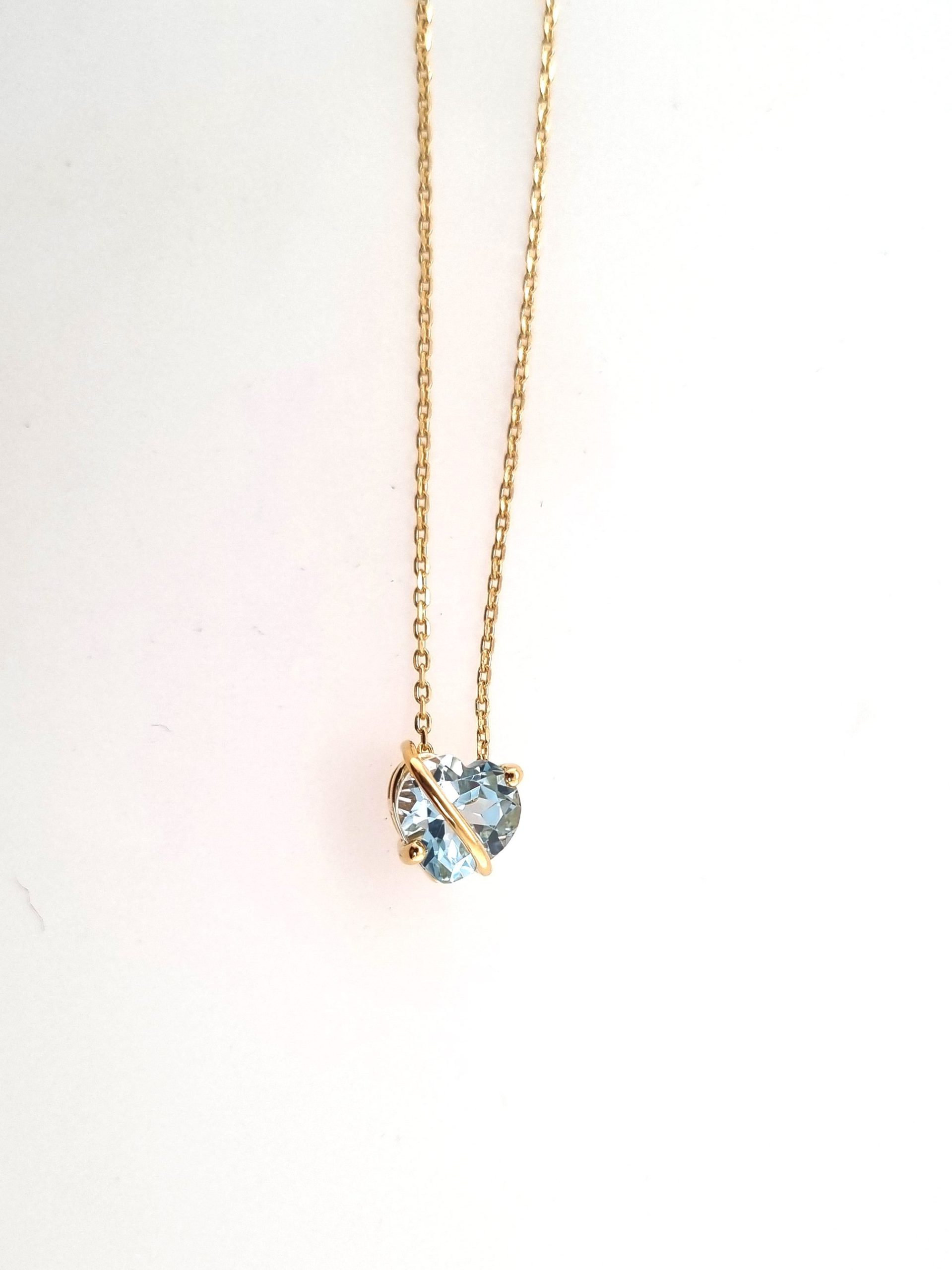 Collier chaîne 40+2cm or jaune 18K avec pendentif topaz bleu cœur serti or jaune 18K