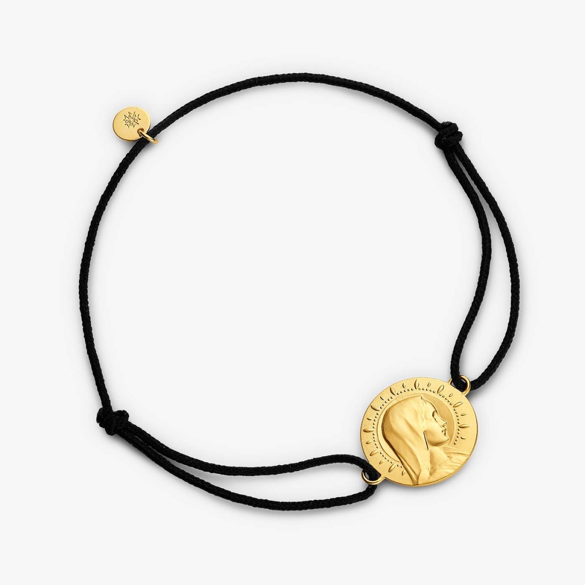 Bracelet cordon noir médaille vierge jeune étoilée 16mm en or jaune 18K finition satinéede la marque française Arthus Bertrand Paris 1803, éco-responsable